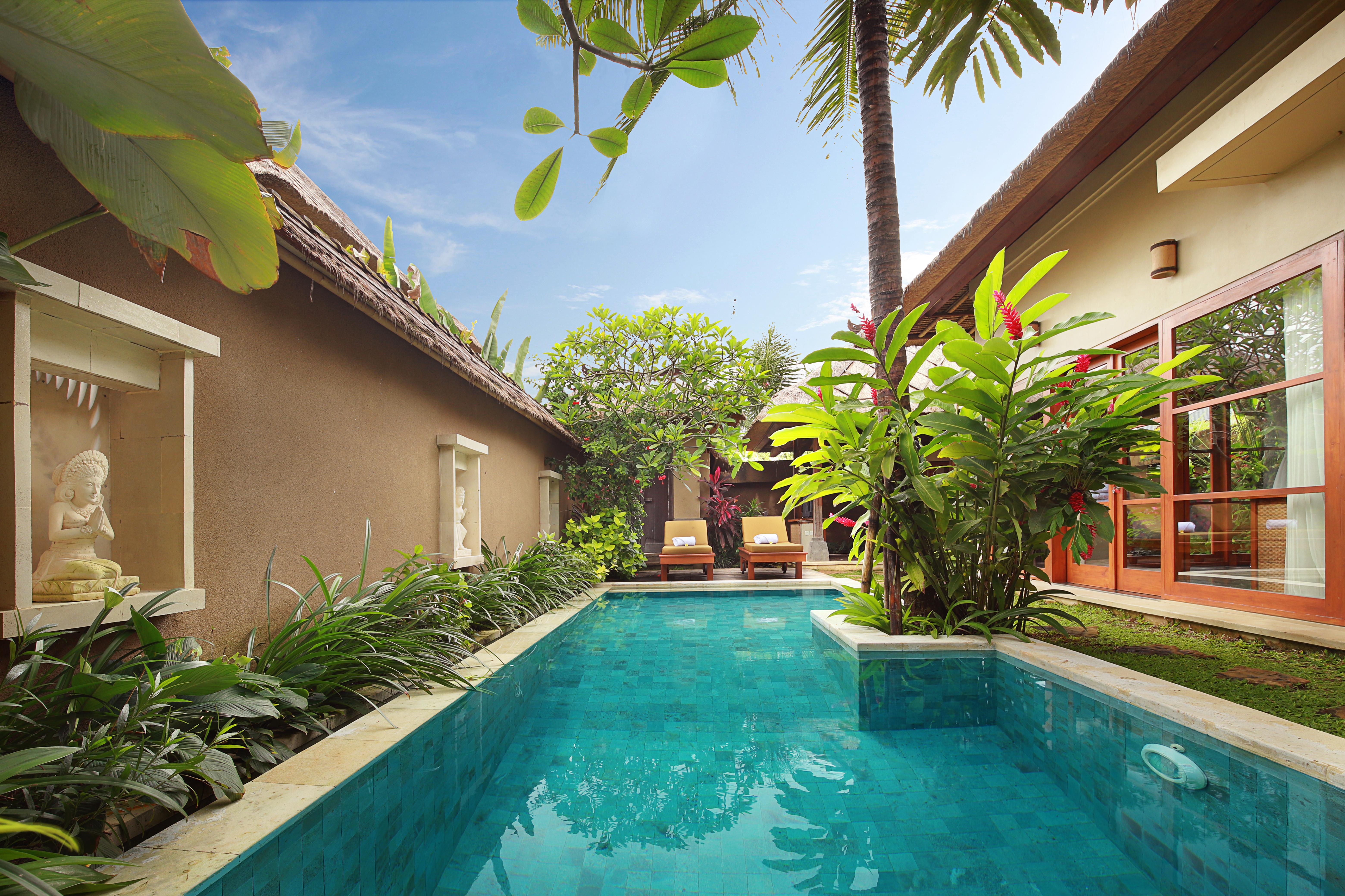 Ubud Nyuh Bali Resort & Spa Экстерьер фото A swimming pool in Bali, Indonesia