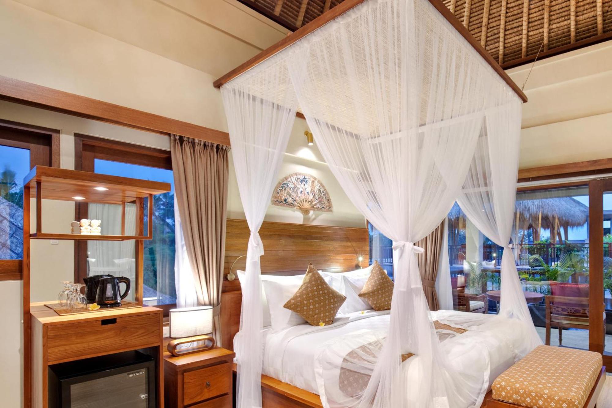 Ubud Nyuh Bali Resort & Spa Номер фото A mosquito net over a bed