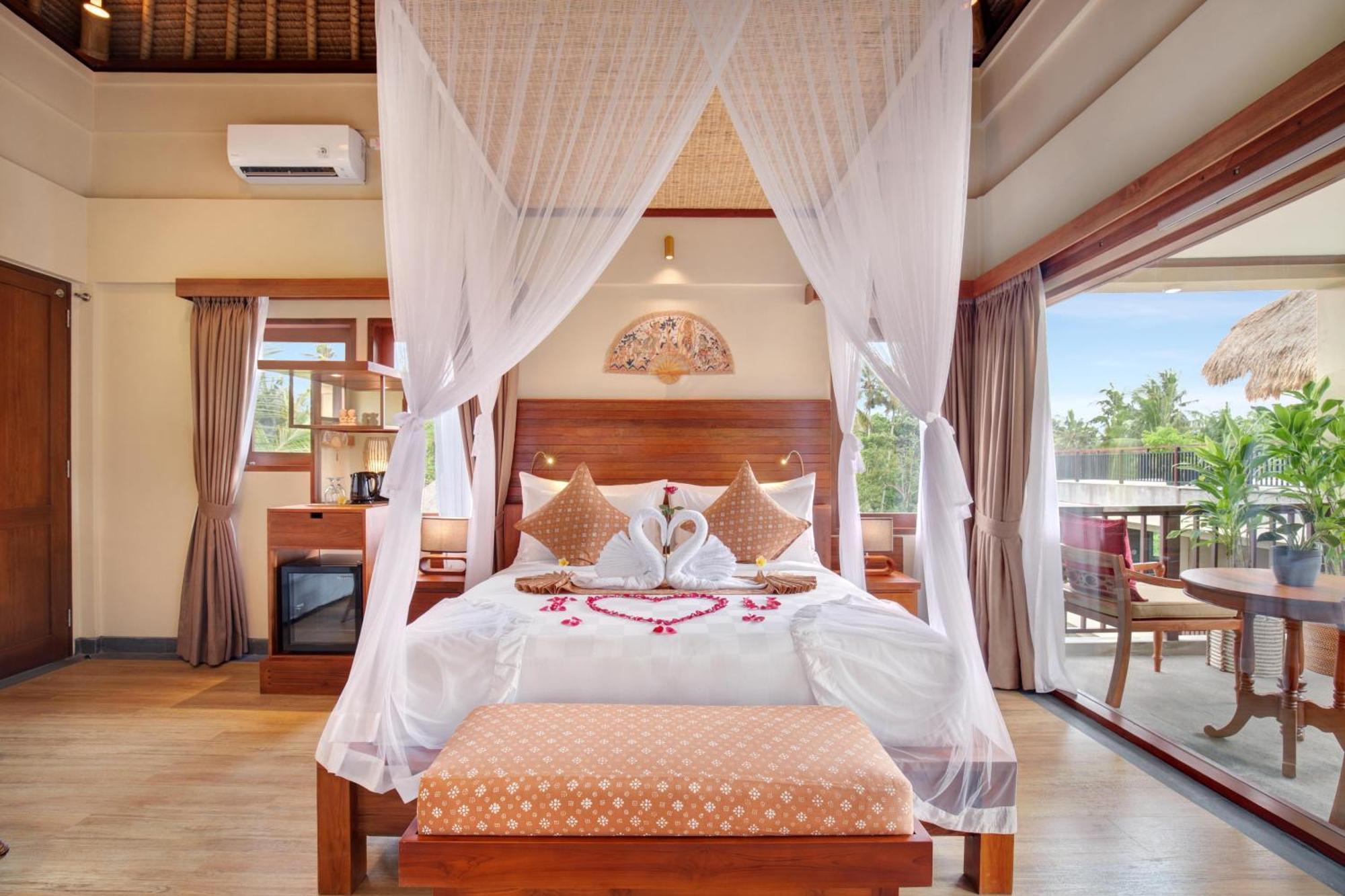 Ubud Nyuh Bali Resort & Spa Номер фото A bedroom at the resort