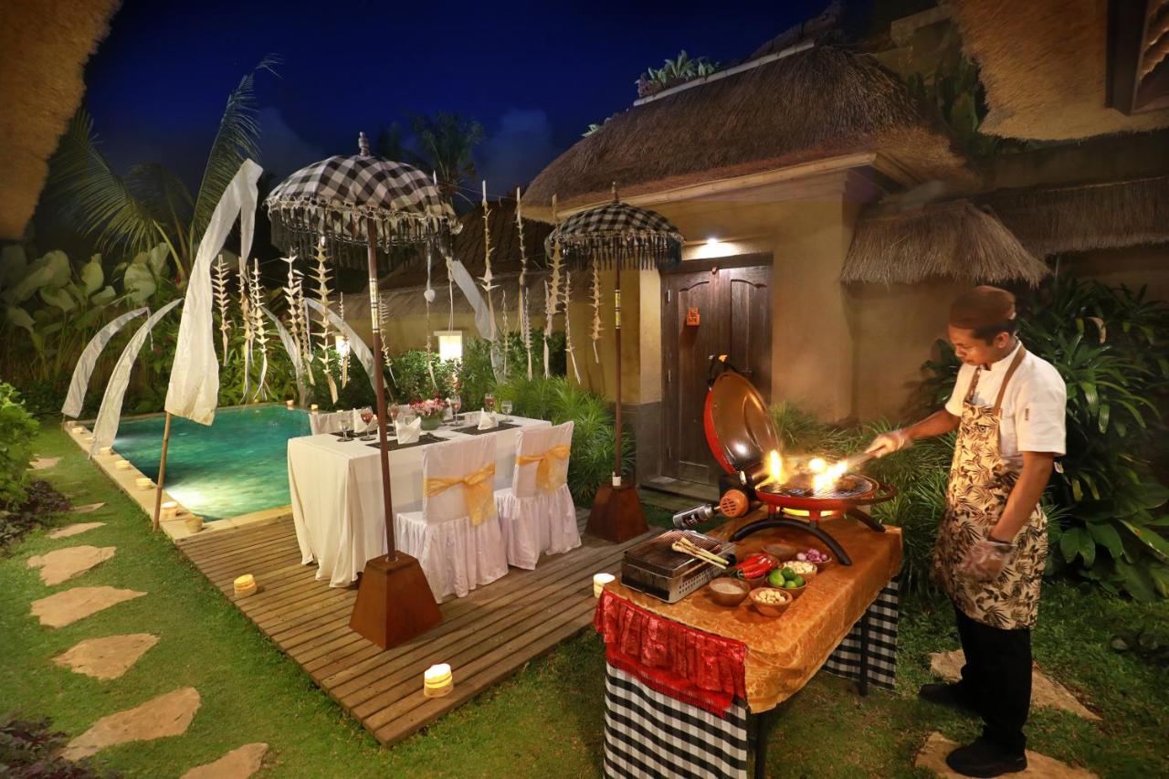 Ubud Nyuh Bali Resort & Spa Экстерьер фото A chef prepares a meal at a resort in Bali, Indonesia.